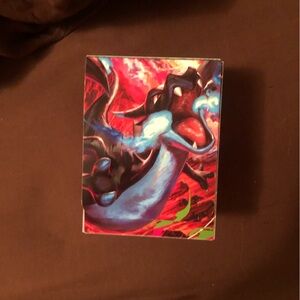 Pokémon Trading Card Game (TCG) deck box featuring Mega Charizard X